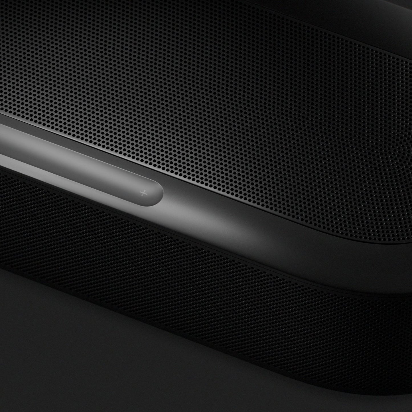Sonos Beam Ultra in black, angled detail of the speaker grille