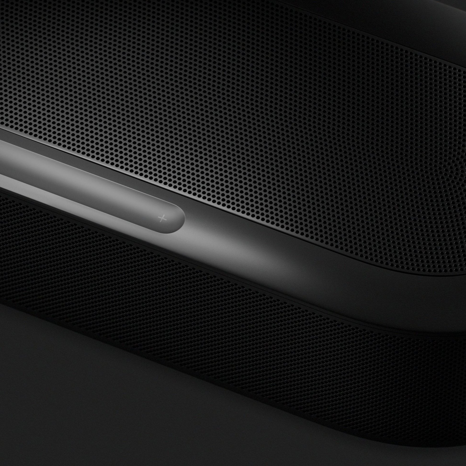 Sonos Beam Ultra in black, angled detail of the speaker grille